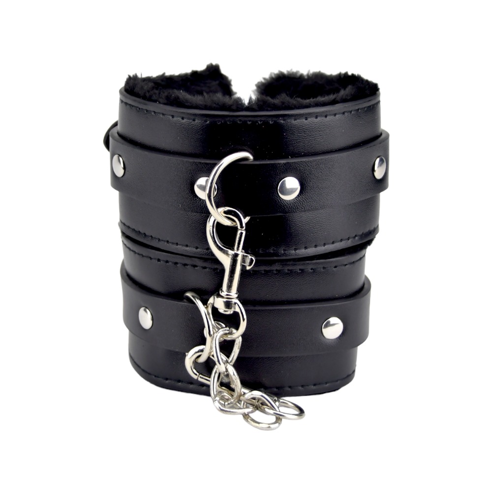 Bound to Please Furry Plush Wrist Cuffs Black, Pair of black plush fur-lined wrist cuffs joined by a short metal chain