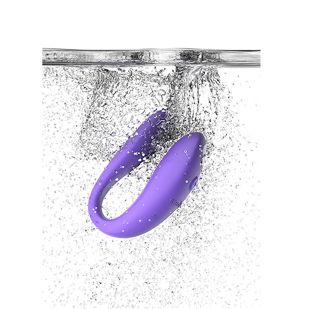 We-Vibe Sync Go Purple, Purple compact wearable couples' vibrator with a curved ergonomic shape