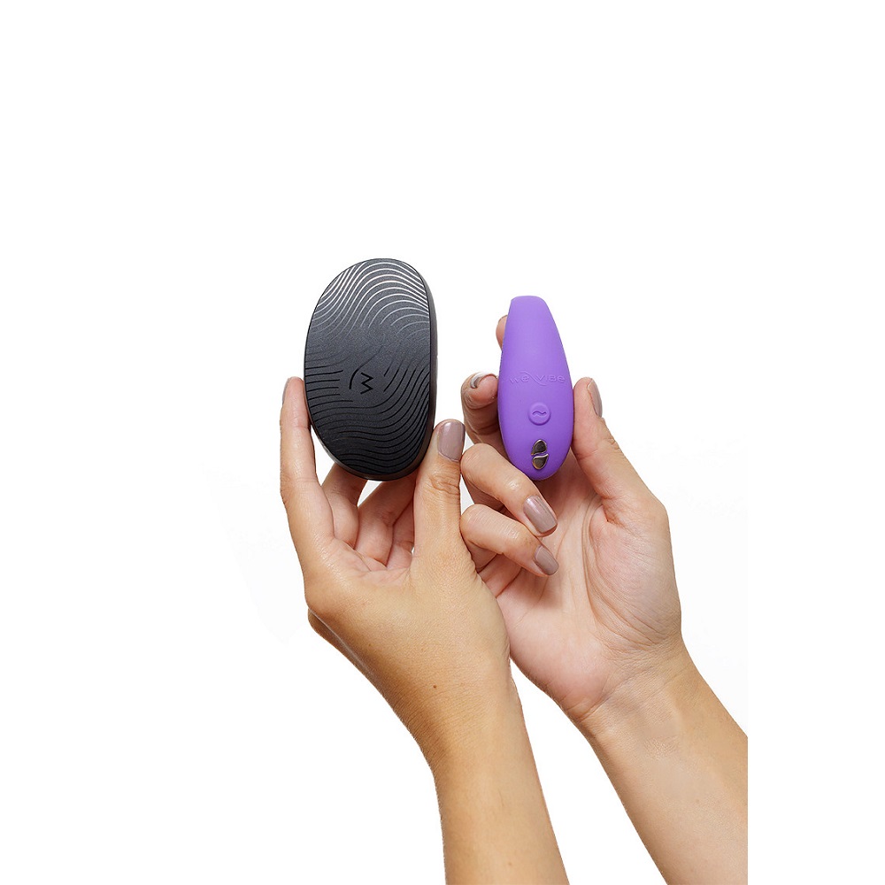 We-Vibe Sync Go Purple, Purple compact wearable couples' vibrator with a curved ergonomic shape